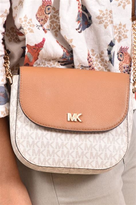 pink michael michael kors mott logo dome crossbody|Mott Logo and Leather Dome Crossbody Bag .